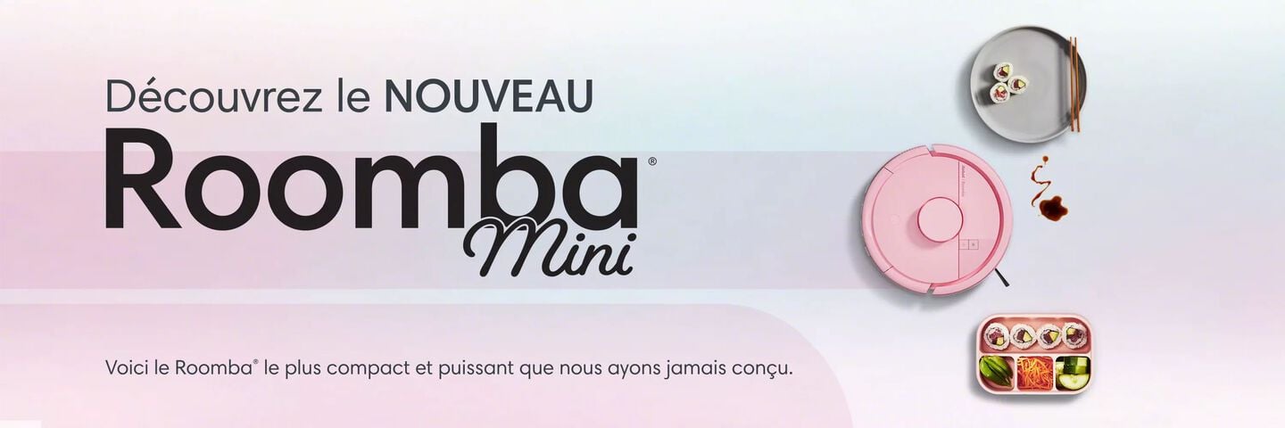 D&eacute;couvrez le nouveau Roomba Mini, le plus petit et le plus puissant Roomba que nous ayons jamais con&ccedil;u. Roomba Mini rose pos&eacute; &agrave; c&ocirc;t&eacute; d&rsquo;une assiette et d&rsquo;une bo&icirc;te &agrave; bento